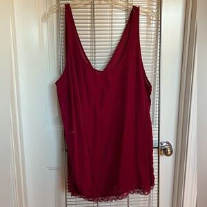 Deep red loose fitting, sheer tank with lace details